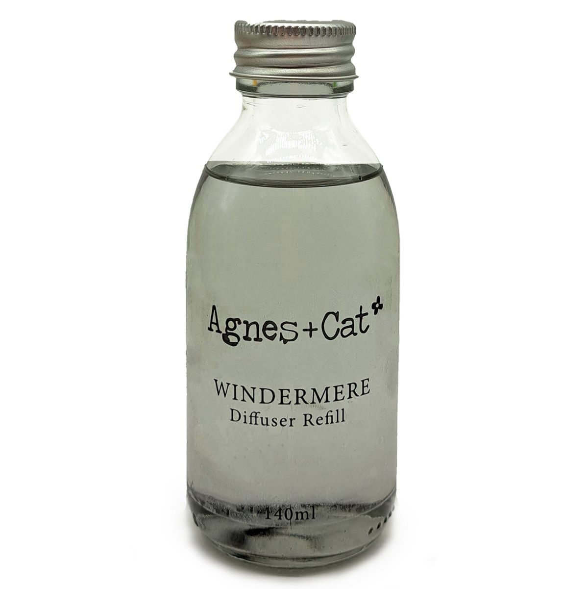 Glass diffuser refill bottle labeled 'Agnes + Cat Windermere' on a white background