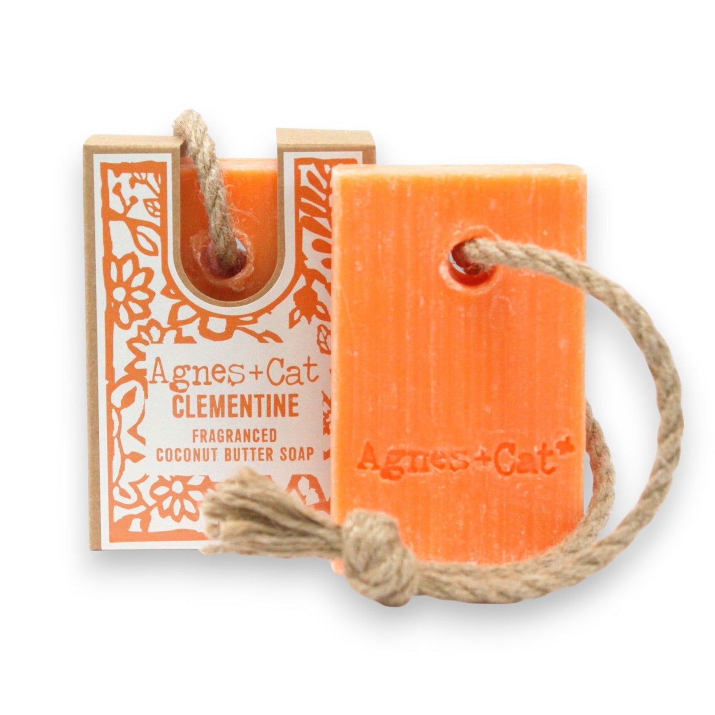Orange soap bar with 'Agnes + Cat' branding on a white background