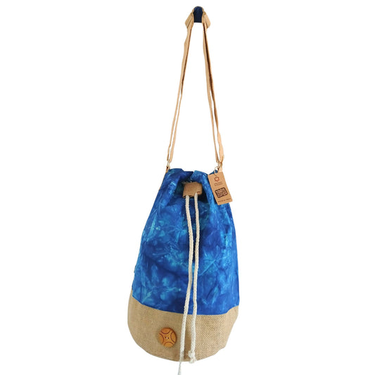 Blue and beige drawstring bag with a brand tag on a white background