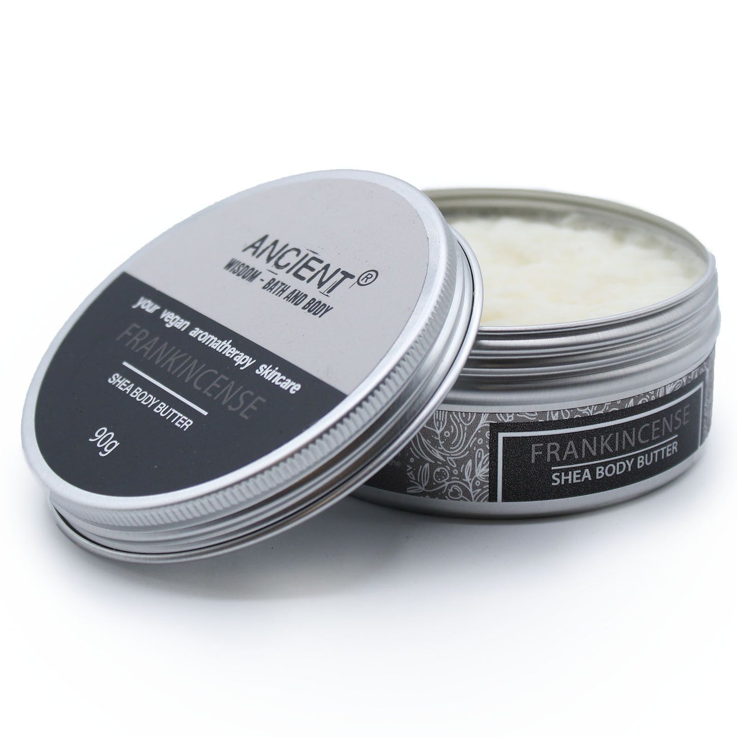 Shea body butter container with lid open on a white background