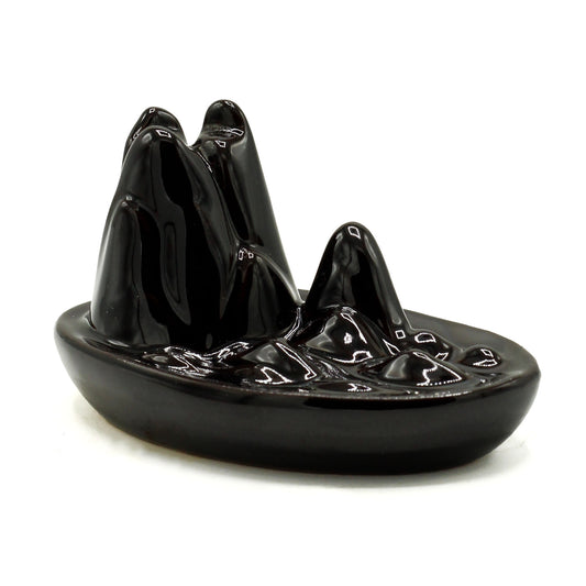 Transform your home into a tranquil haven with a backflow incense burner Mini Mountain. Designed to work with backflow incense cones.