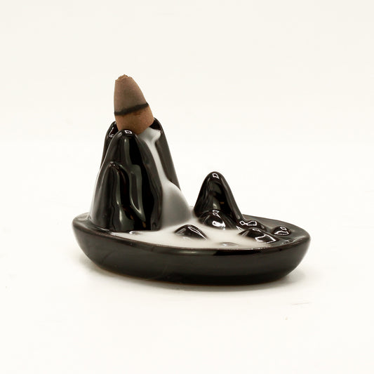 Transform your home into a tranquil haven with a backflow incense burner Mini Mountain. Designed to work with backflow incense cones.