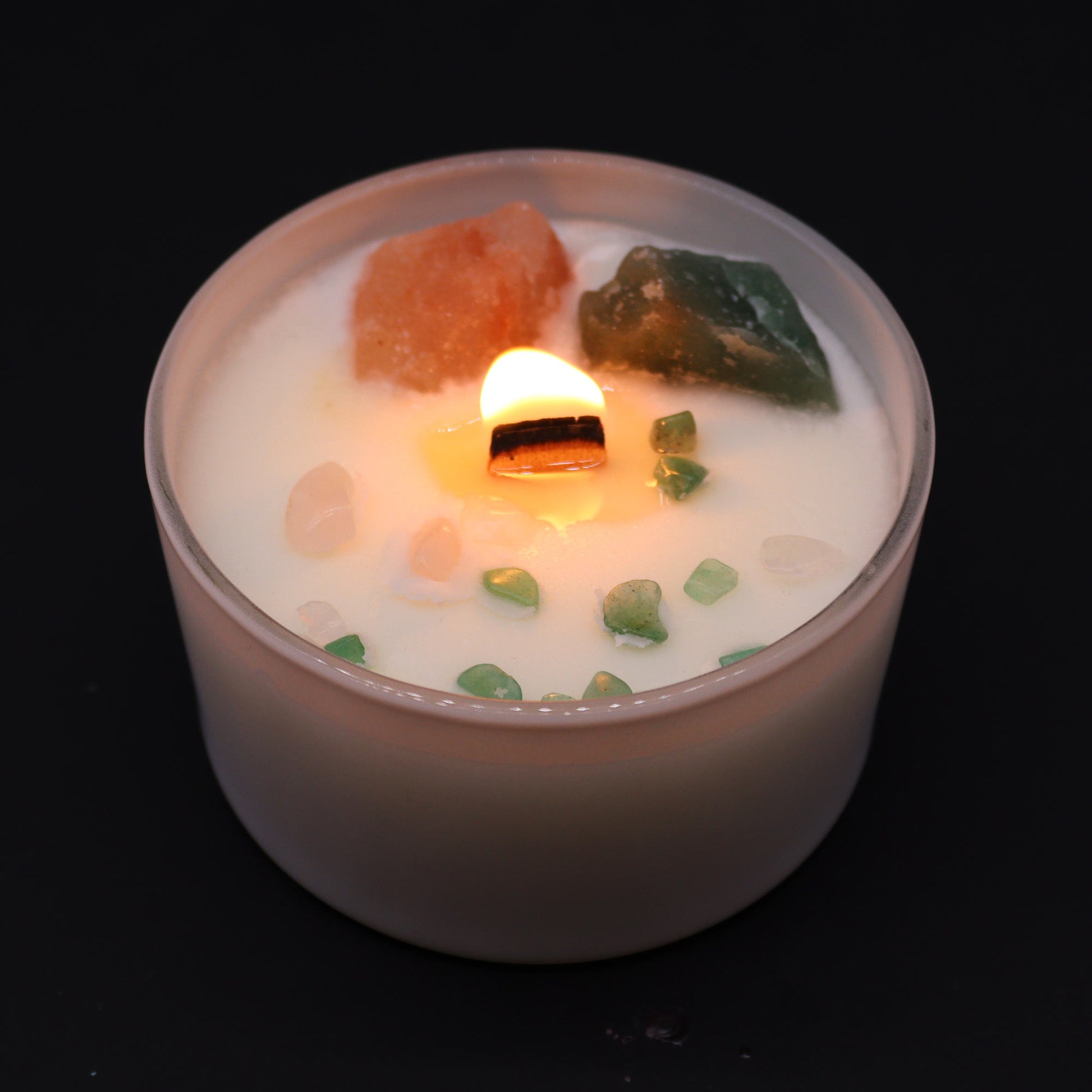 Unlock the power of your Heart Chakra with this enchanting soy wax crystal candle lit. Embedded with Rose Quartz and Crystal Jade crystals.