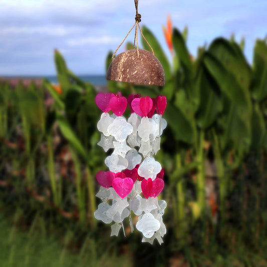 Add a splash of coastal charm to your home or garden with these beautiful Coconut & Capiz Windchimes Pink and White Mix Shape