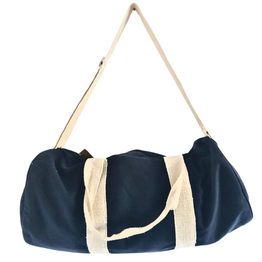 Navy blue duffel bag with beige handles and mesh side pocket on a white background