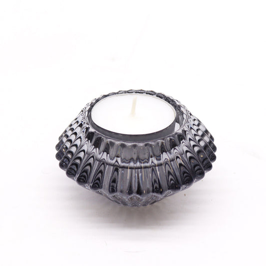 Add a touch of versatility and elegance to your home with the Flower Flip Dinner Candle / Tealight Holder in Midnight Grey.