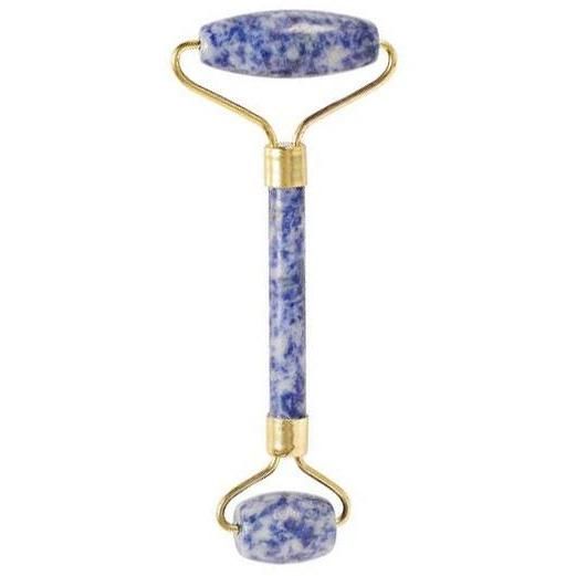 Facial roller with blue and white marbled design on a white background
