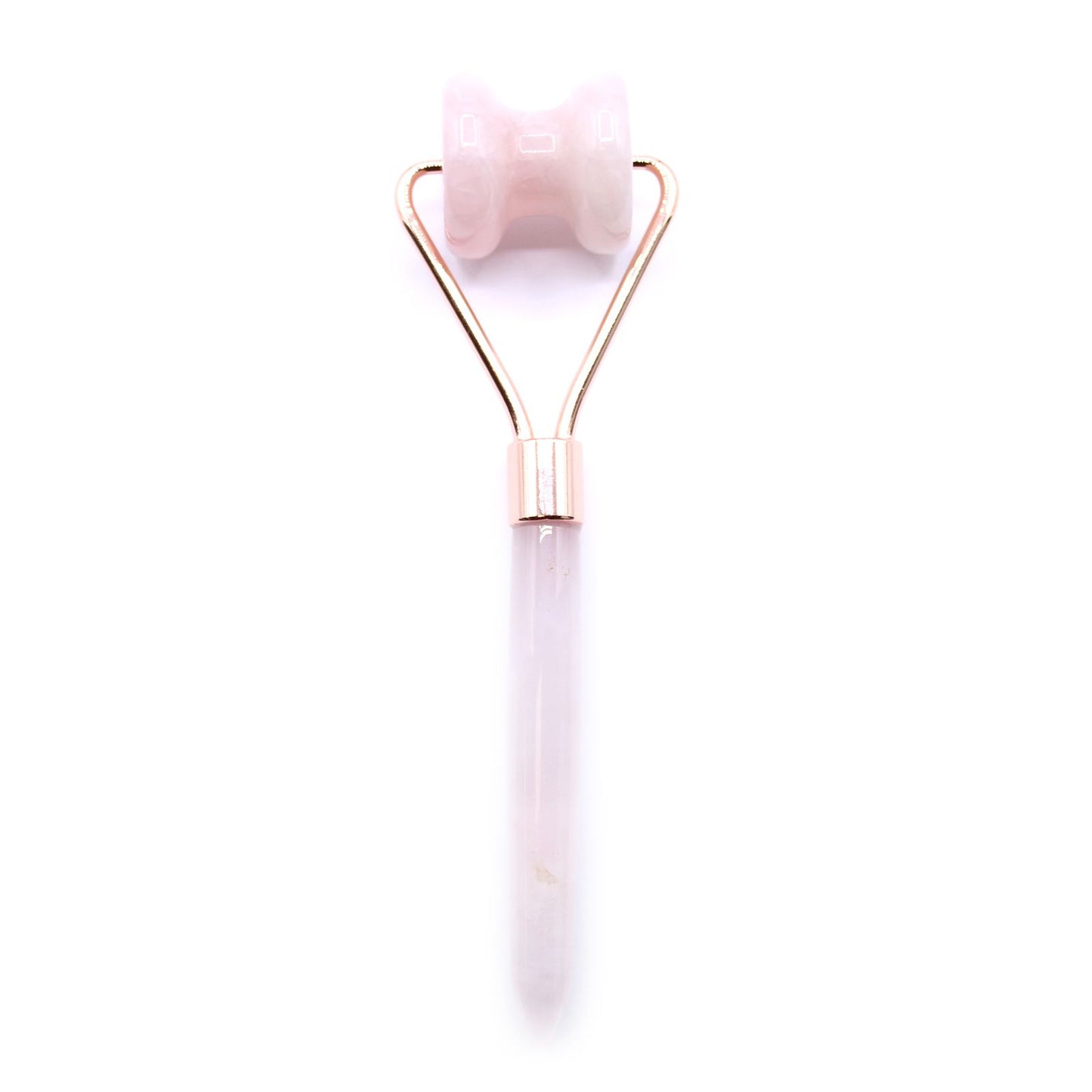 Rose gold and white facial roller on a white background