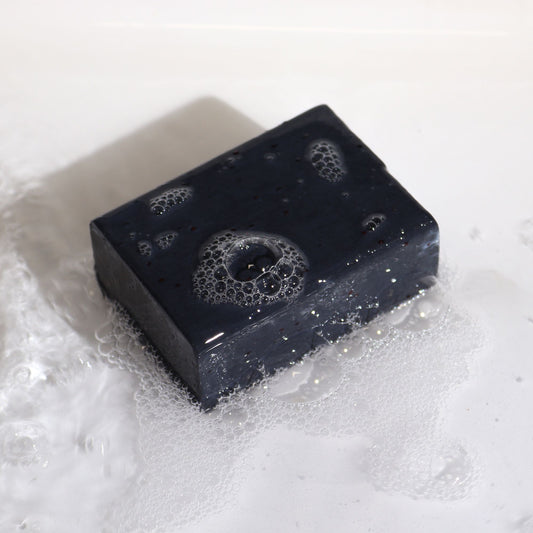 Black cassette tape on a white background