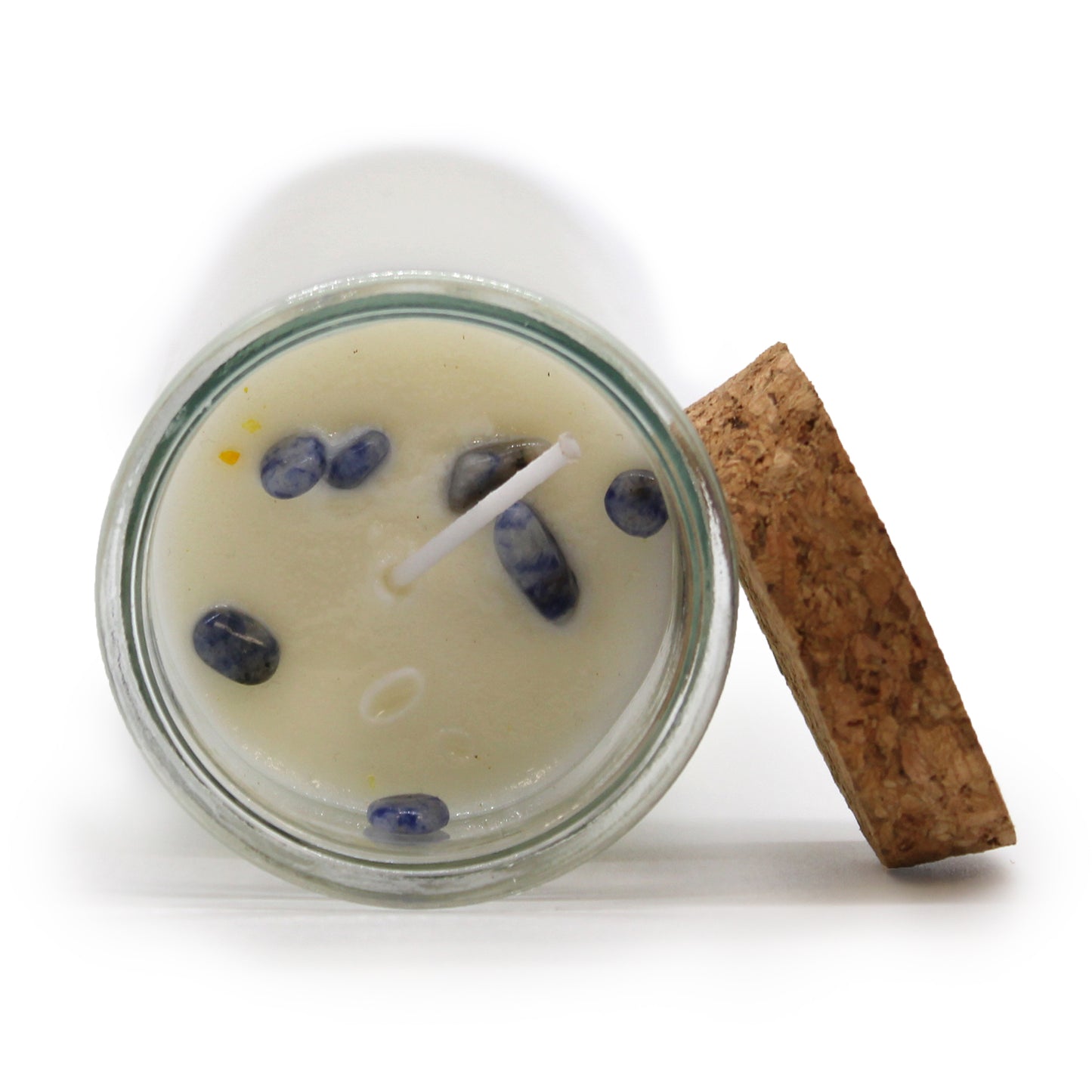 This candle is designed to envelop you in a sense of protection, creating a sanctuary of peace and harmony. crystal