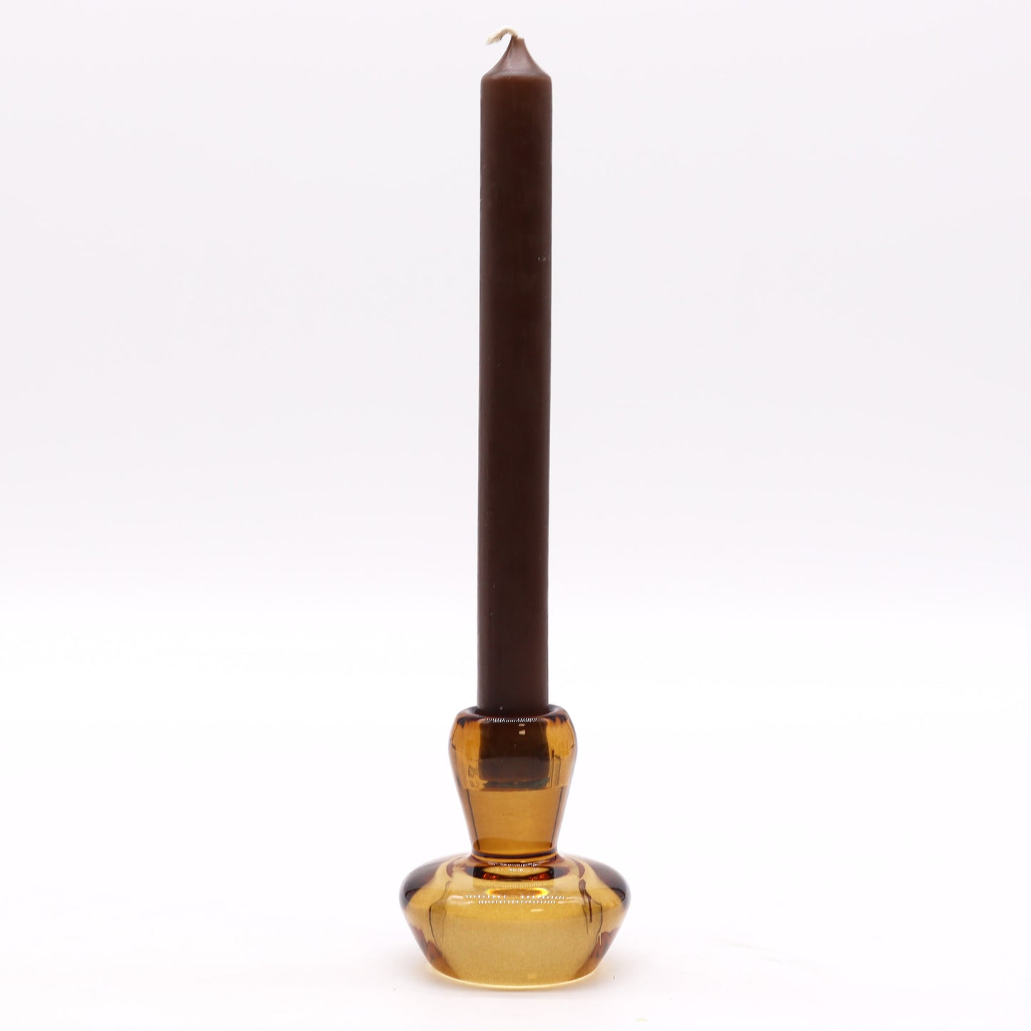 Mushroom Flip Dinner Candle / Tealight Holder in Antique Amber is crafted from high-quality glass. This cleverly designed piece can be used with both dinner candles and tealights