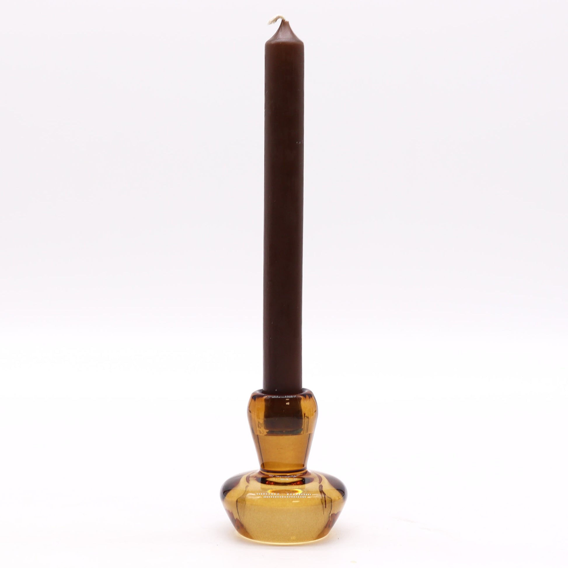 Mushroom Flip Dinner Candle / Tealight Holder in Antique Amber is crafted from high-quality glass. This cleverly designed piece can be used with both dinner candles and tealights