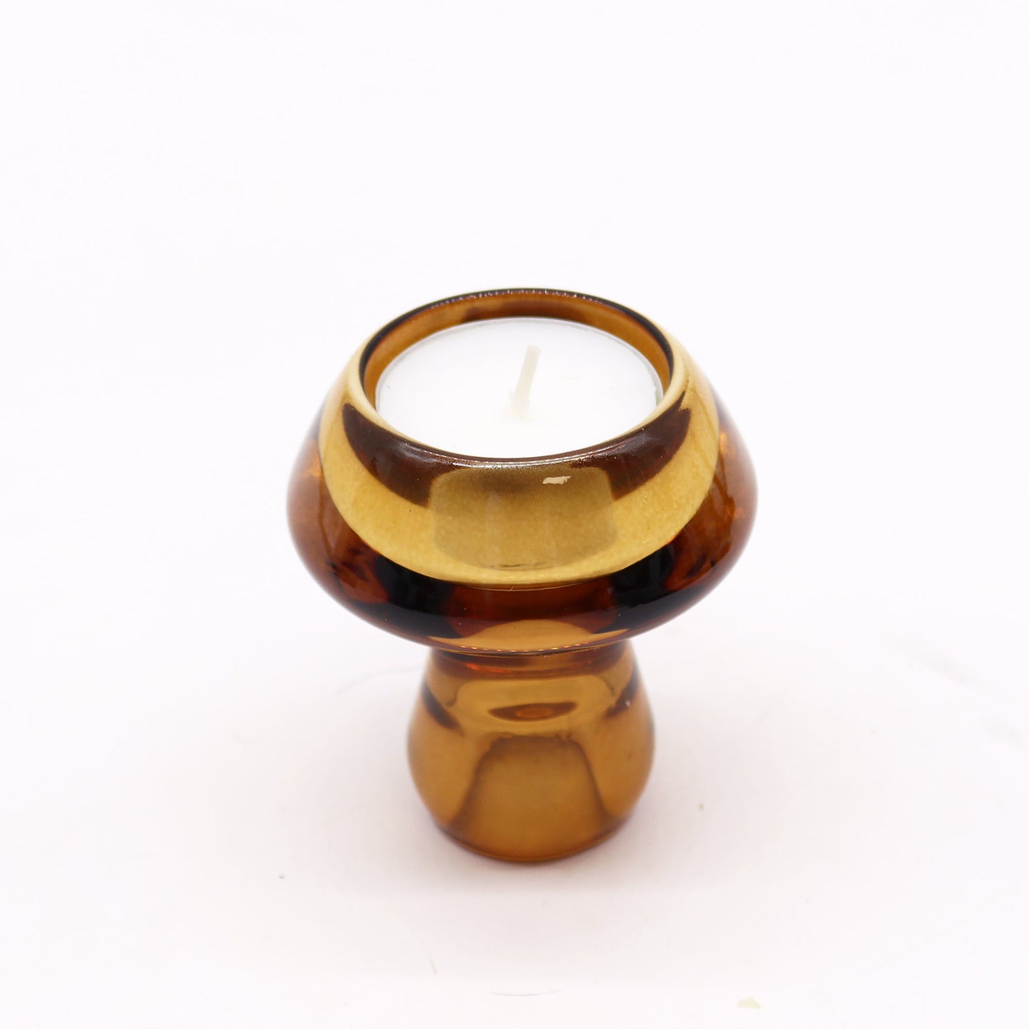 Mushroom Flip Dinner Candle / Tealight Holder in Antique Amber is crafted from high-quality glass.