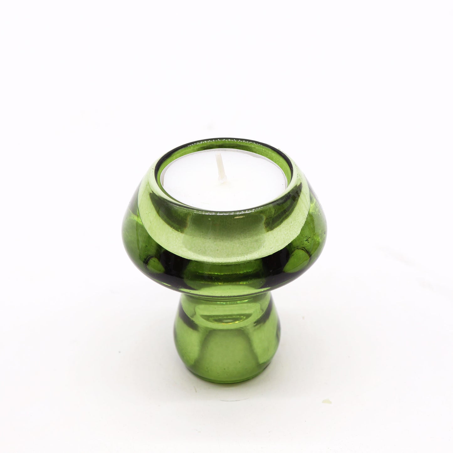 Mushroom Flip Dinner Candle / Tealight Holder in Garden Jade is crafted from high-quality glass.