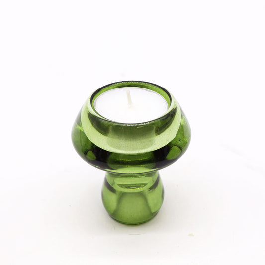 Mushroom Flip Dinner Candle / Tealight Holder in Garden Jade is crafted from high-quality glass.