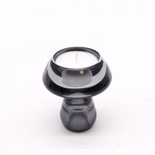 Mushroom Flip Dinner Candle / Tealight Holder in Midnight Grey is crafted from high-quality glass. This cleverly designed piece can be used with both dinner candles and tealights.