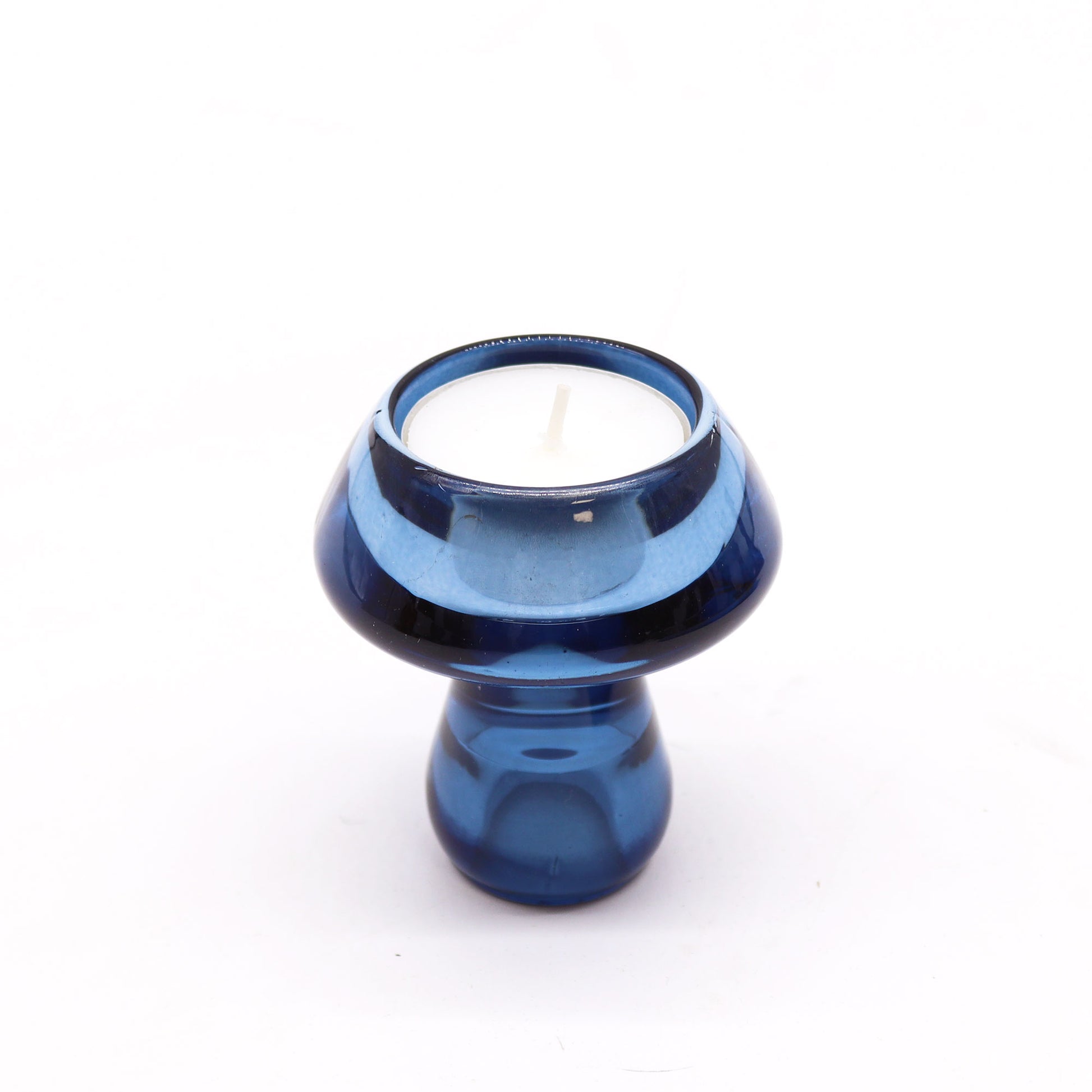 Mushroom Flip Dinner Candle / Tealight Holder in Royal Blue is crafted from high-quality glass.
