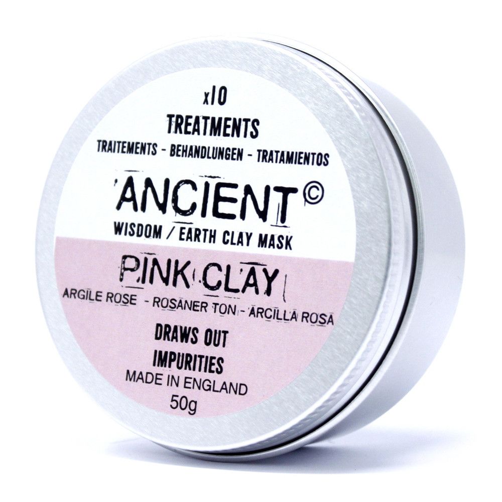 Pink clay mask container with white lid on a white background