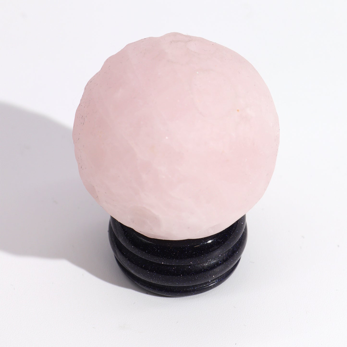 Bring a touch of cosmic beauty into your space with the Rose Quartz Planet Venus.
