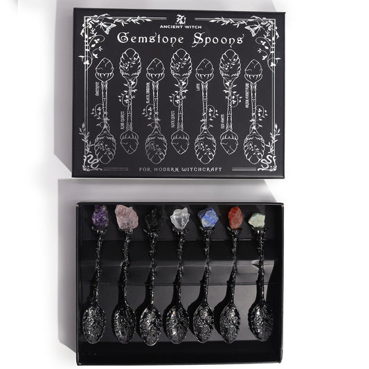 Set of 7 Dark Silver Gemstone Crystal Witch Spoons. Each beautifully finished spoon features a natural gemstone, chosen for its unique energetic qualities, making this set perfect for meditation, spellwork, or mindful daily use boxed