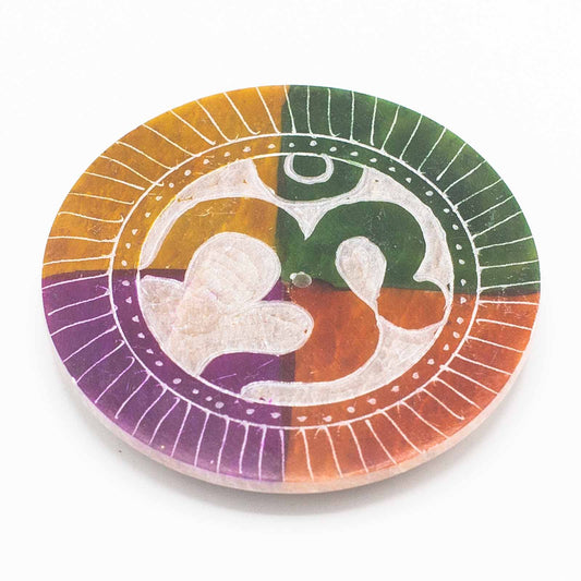 Add a touch of elegance and tranquillity to your space with a soapstone Disc incense holder Om.