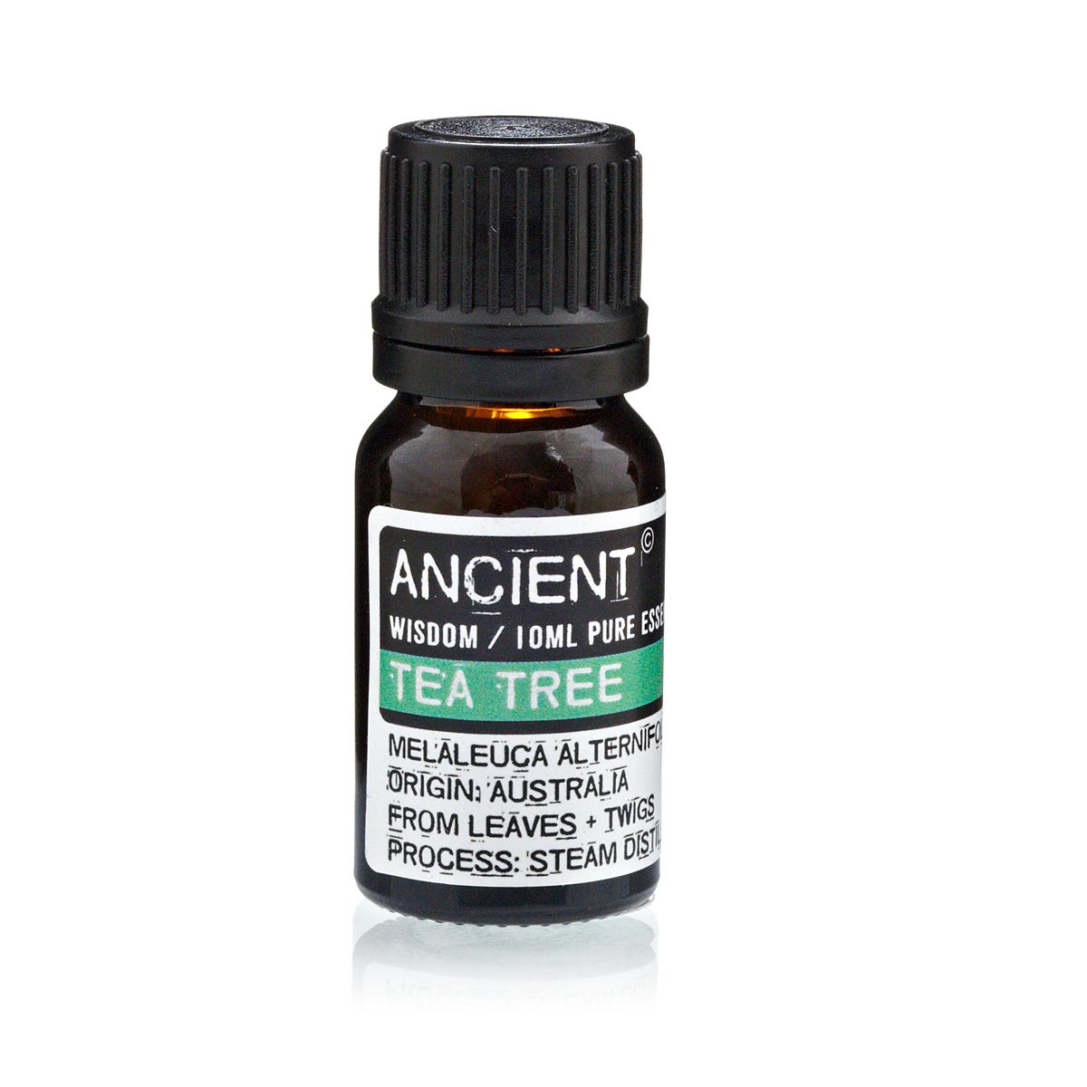 Tea tree essential oil bottle with label on a white background