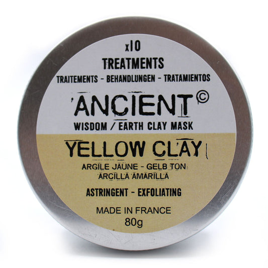 Yellow clay mask container with 'Ancient Wisdom' branding on a white background