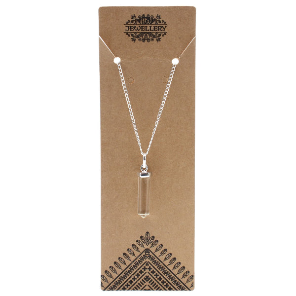 Necklace with a clear pendant on a brown jewelry card
