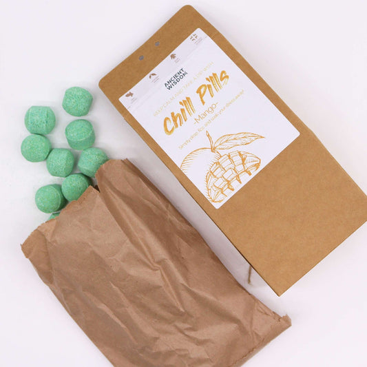 Brown package labeled 'Chill Pills' with green capsules on a white background