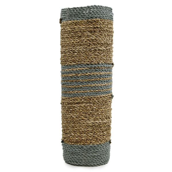 Woven cylindrical basket with striped pattern on a white background