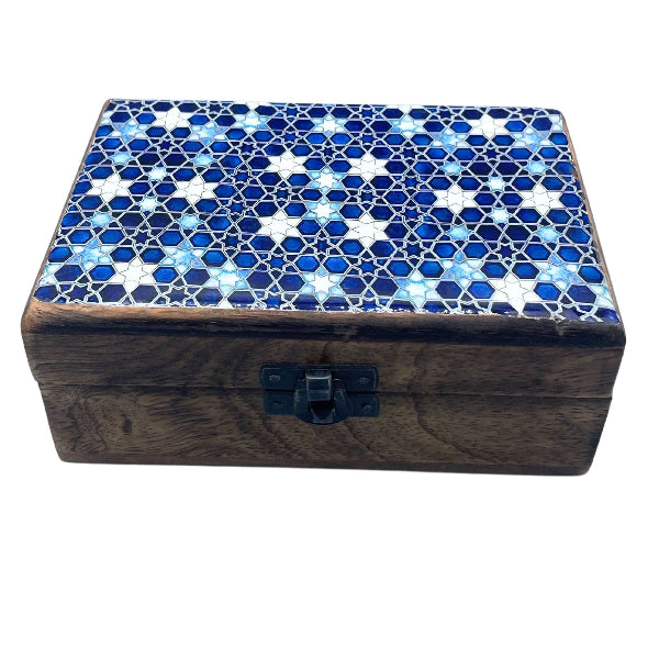 Wooden box with a blue and white mosaic lid on a white background