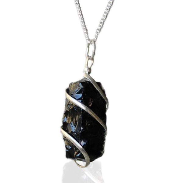 Necklace with a black crystal pendant on a white background