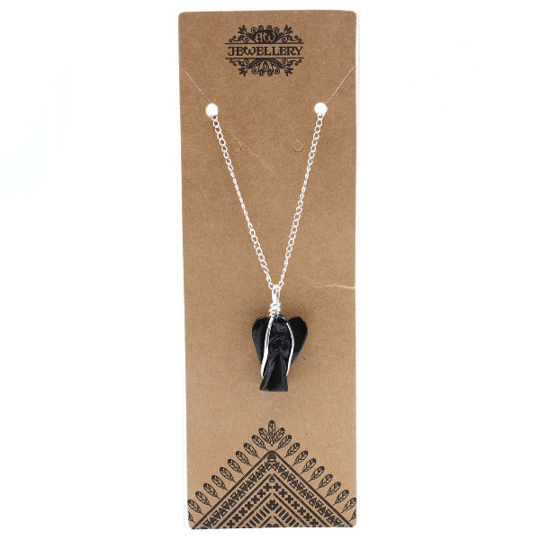 Necklace with a black pendant on a brown jewelry card
