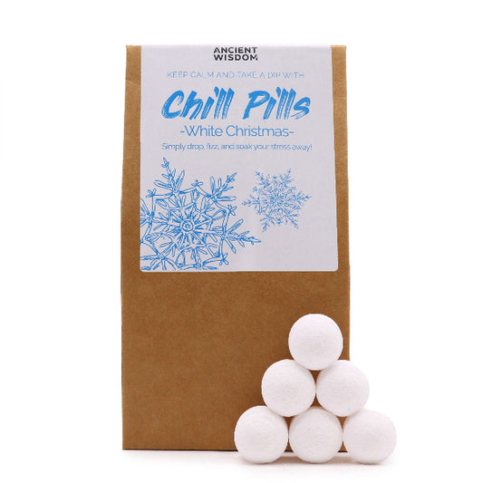 Packaging of 'Chill Pills' with white Christmas design on a white background
