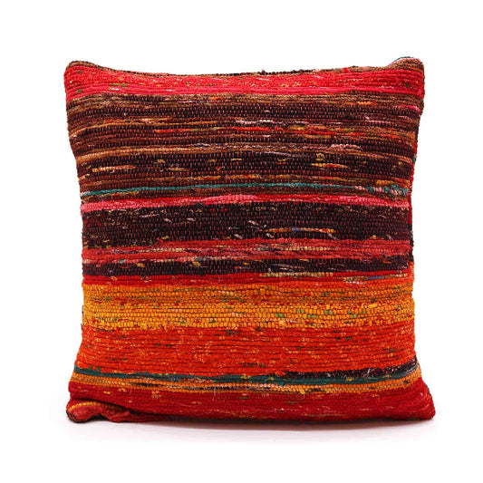 Multicolored striped pillow on a white background