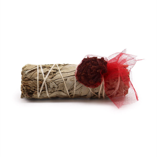 Rolled sage with red decorative elements on a white background