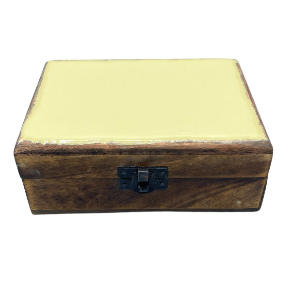 Wooden box with a yellow lid on a white background