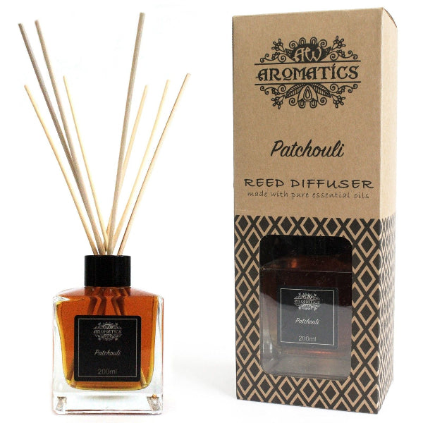 Patchouli reed diffuser with packaging on a white background
