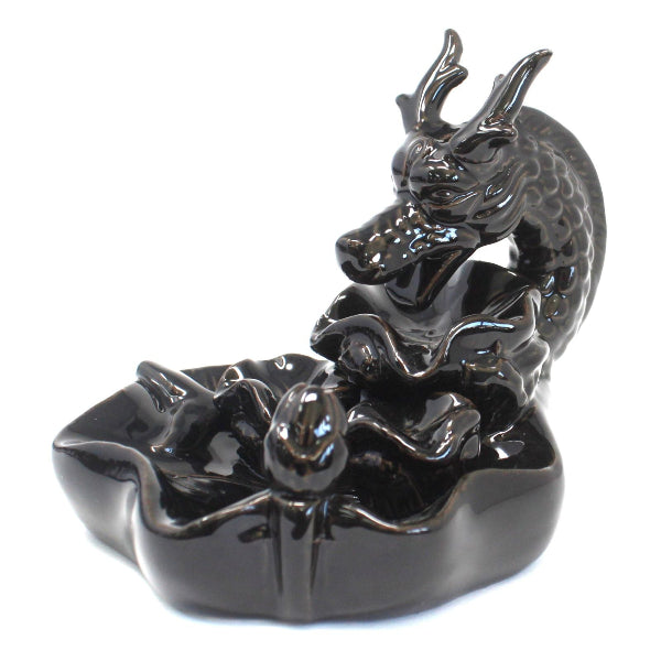 Black dragon incense burner on a white background