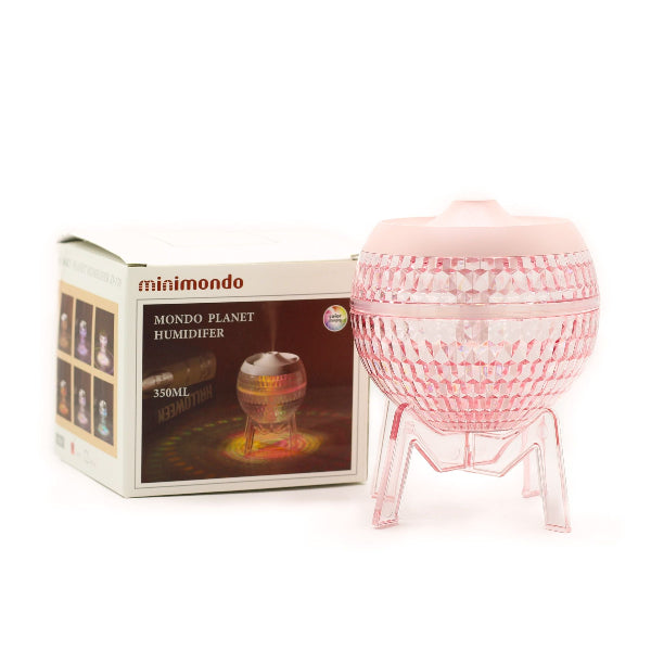 Pink textured humidifier with packaging labeled 'minimondo' on a white background