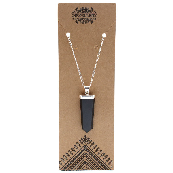 Necklace with a black pendant on a brown jewelry card