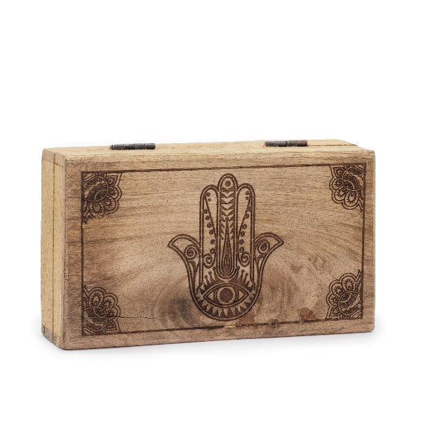 Wooden box with Hamsa hand design on a white background