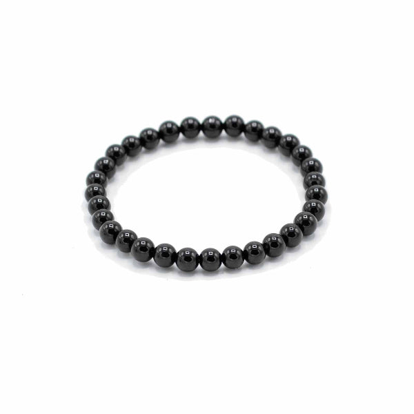 Black beaded bracelet on a white background