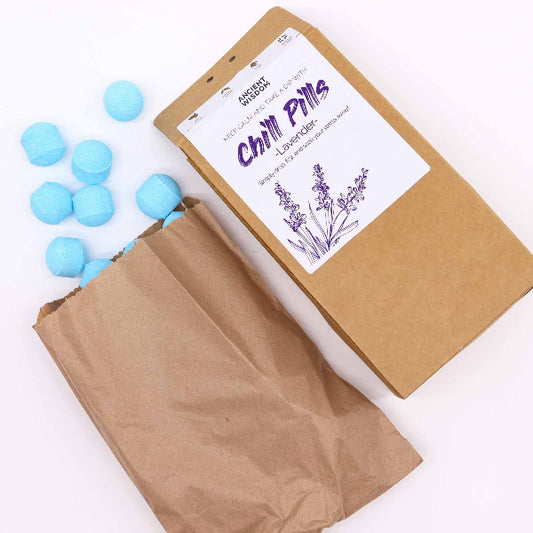 Box of 'Chill Pills' with blue balls on a white background