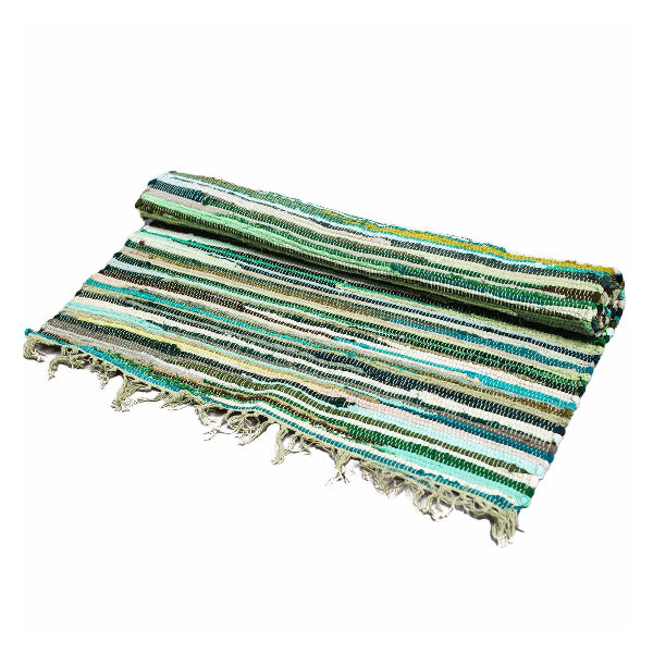 Striped woven mat with fringes on a white background