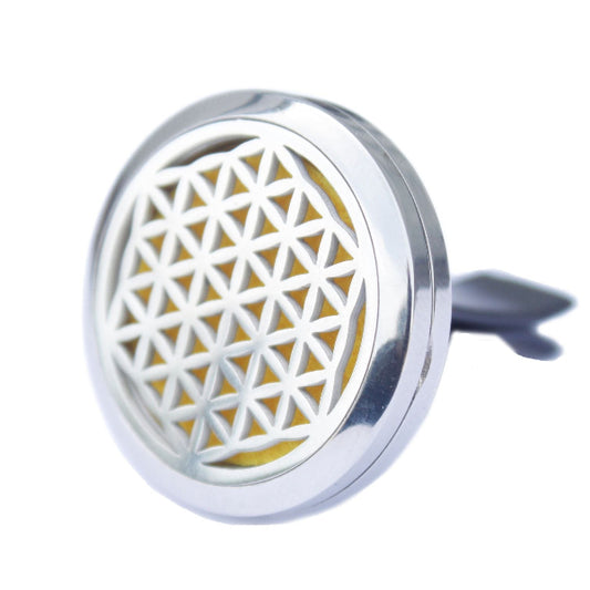 Decorative diffuser with geometric design on a white background