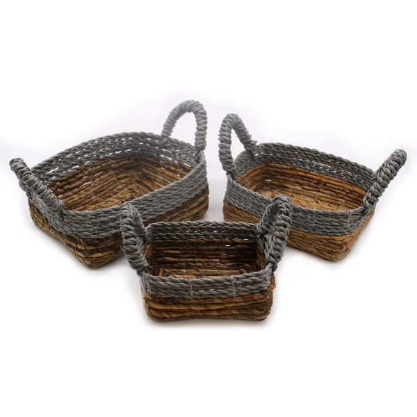 Three woven baskets with gray handles on a white background