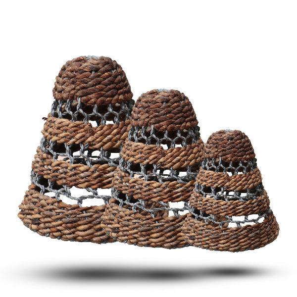 Set of woven baskets with a textured surface on a white background