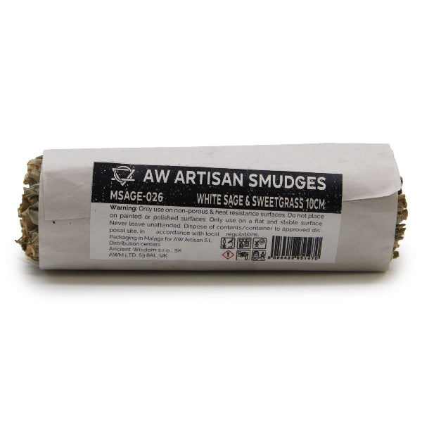 Rolled white sage and sweetgrass smudge stick with label on a white background