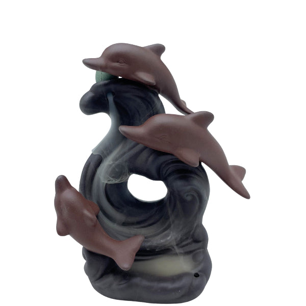 Decorative incense burner with three dolphins on a white background